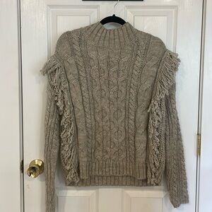 Ruffled knit sweater